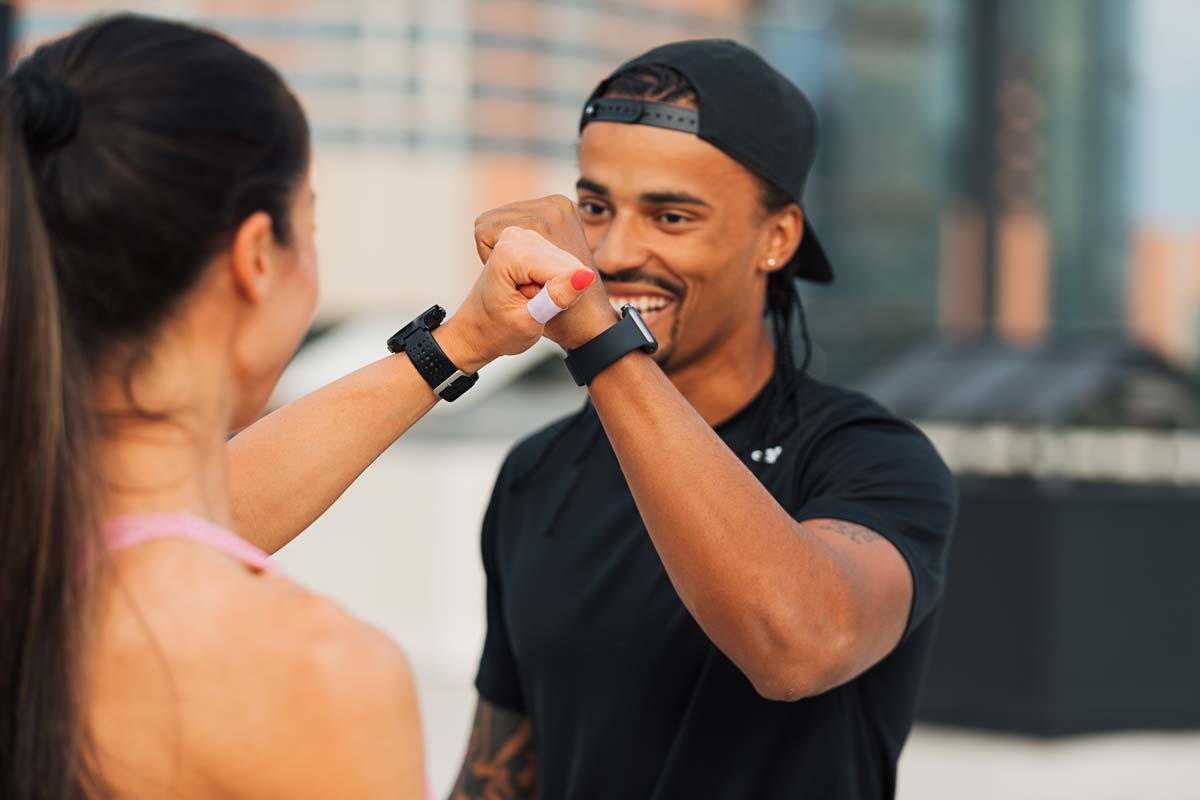 fitness-couple-giving-fist-bump-1200px